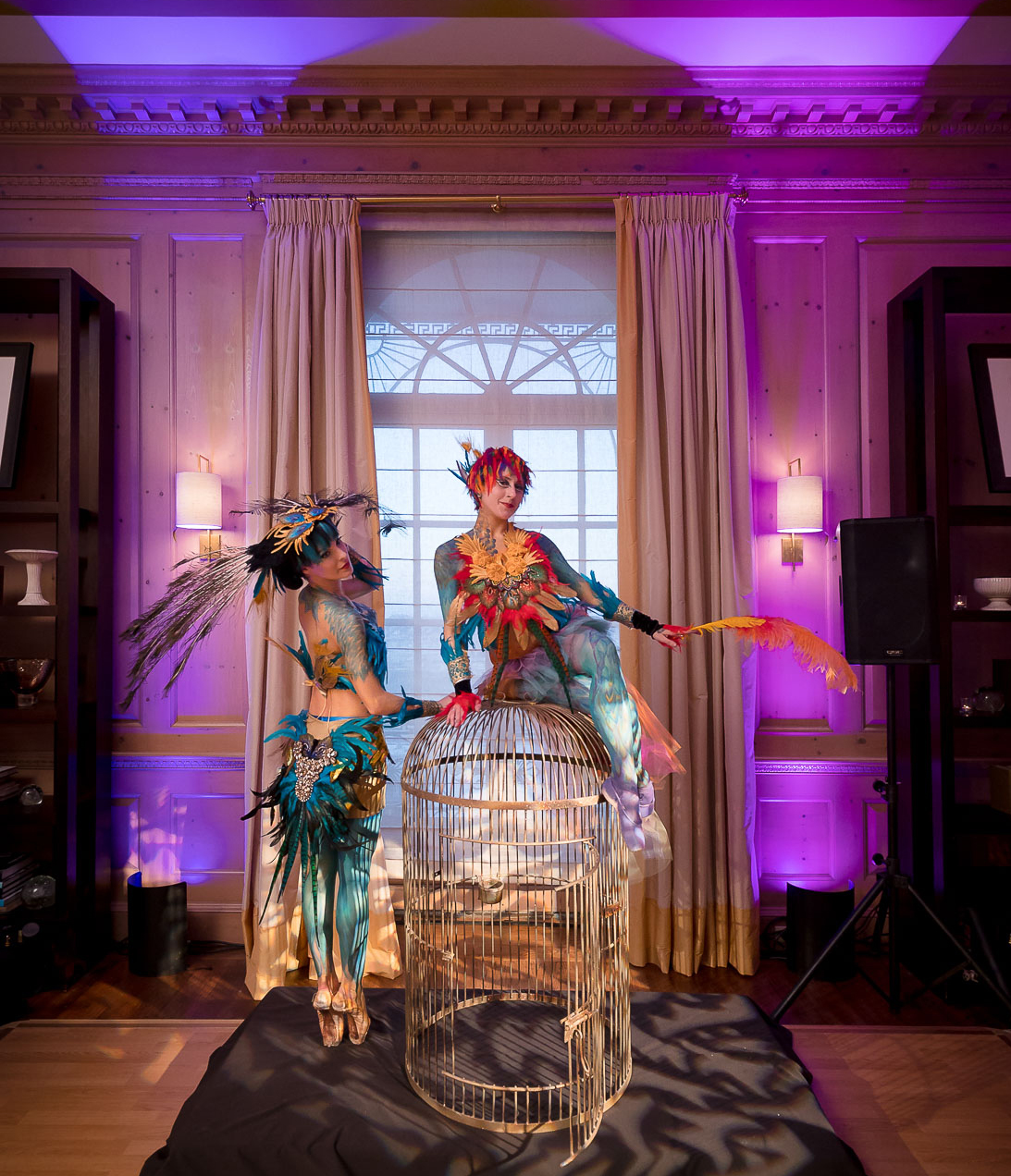 Catalyst Arts body painted birds of paradise ballerinas with giant golden cage in penthouse for private birthday event