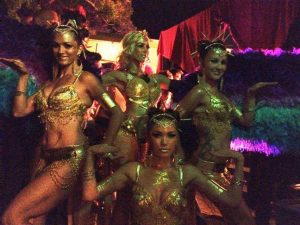 Gold Showgirl dancers