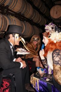 Tarot Tray Lady talking to a Masked Man