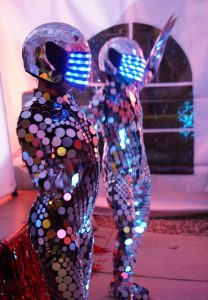 Mirror dancers & LED Helmet Mirror Suit performers by Catalyst Arts California
