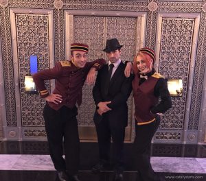 20's Party classic bellhop attendants & green absinthe fairy flappers by Catalyst Arts Entertainment in CA
