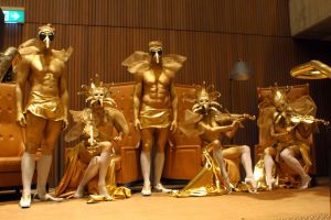 Masked Golden Living Statues