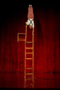 Chair stacking acrobat performer in SF- Jeremy- bookable via Catalyst Arts Entertainment