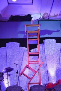 Chair stacking acrobat performer in SF- Jeremy- bookable via Catalyst Arts Entertainment