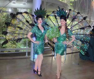 Two Rainforest Peacock Showgirls in a green peacock costume