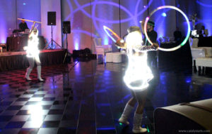 Two Glow Go Dancers Dancing with Led Light Hoops