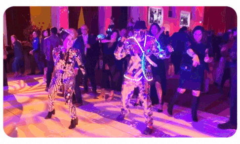 Mirror Dancers guiding guests on the dance steps at a gala after party