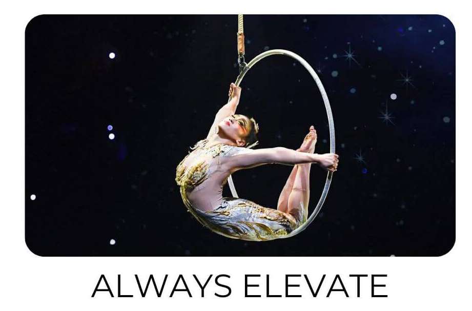 Always Elevate Text with an acrobat performing on an elevated hoop on the background