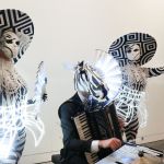 Cirque twins costumed entertainment & unique musical acts booking with Catalyst Arts