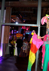 Colorful Flower Stiltwalker Duo