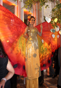 Red Silk Butterfly Costumed Stilt Walking Characters by Catalyst Arts entertainment in CA- www.catalystarts.com