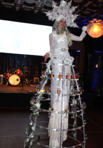 Deluxe Champagne Skirt Stilt Walker at winter wonderland holiday party- by Catalyst Arts SF