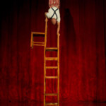 Chair stacking acrobat performer in SF- Jeremy- bookable via Catalyst Arts Entertainment