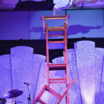 Chair stacking acrobat performer in SF- Jeremy- bookable via Catalyst Arts Entertainment