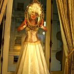 Golden Versailles Venetian Edwardian Victorian inspired performer holding a vintage frame i